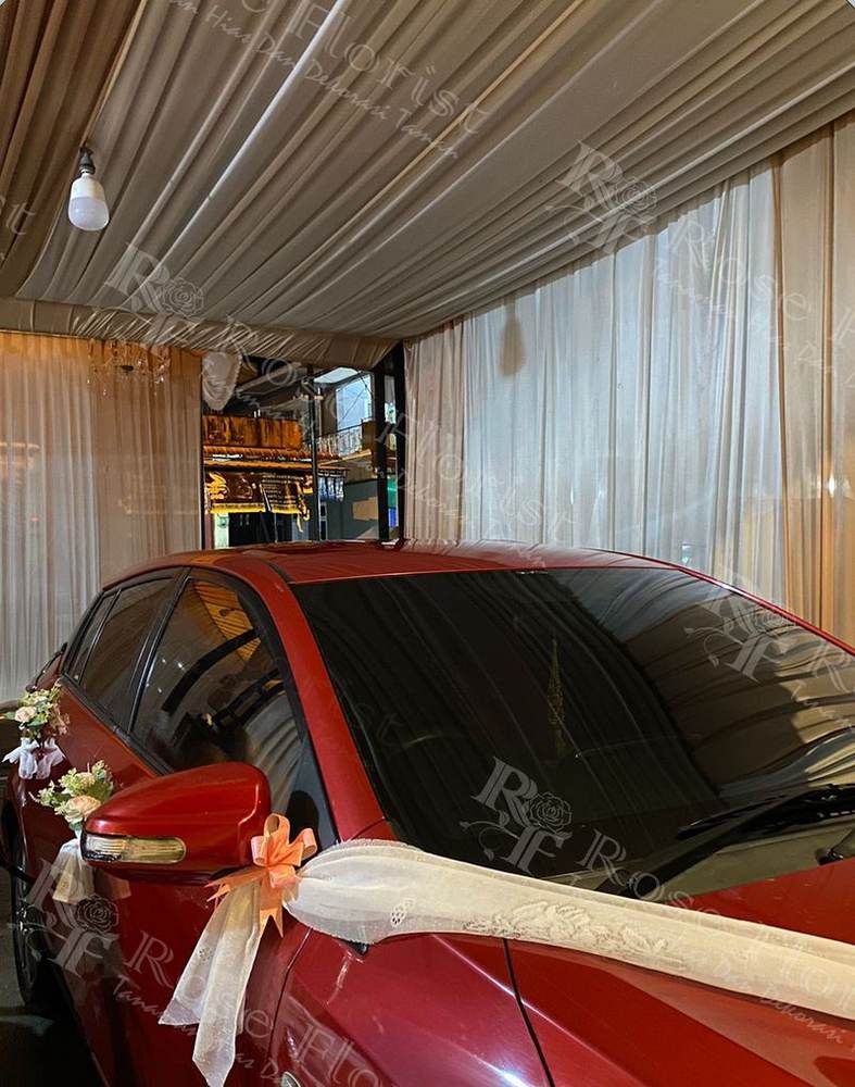 Pita dan bunga spion mobil pengantin
