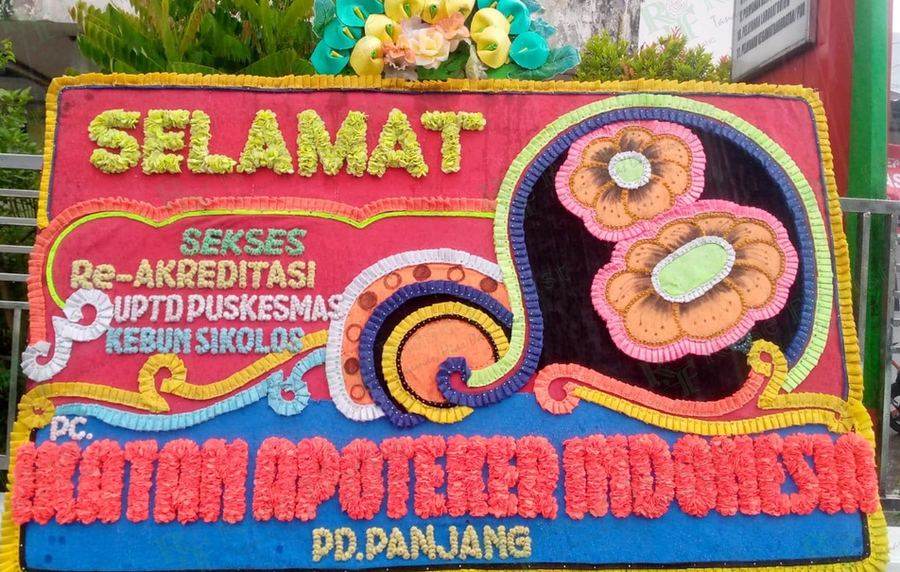 Papan bunga ucapan selamat