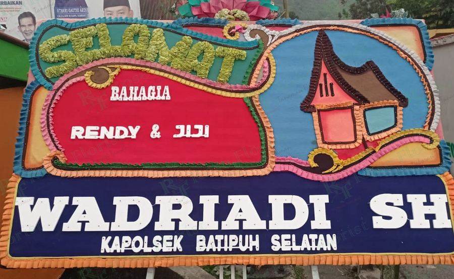 Papan bunga ucapan selamat